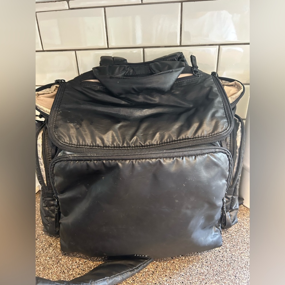 Caraa diaper bag 
Black, medium size